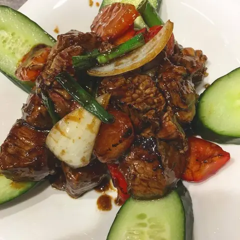 Bo Luc Lac, seared cubes of beef with peppers and onions