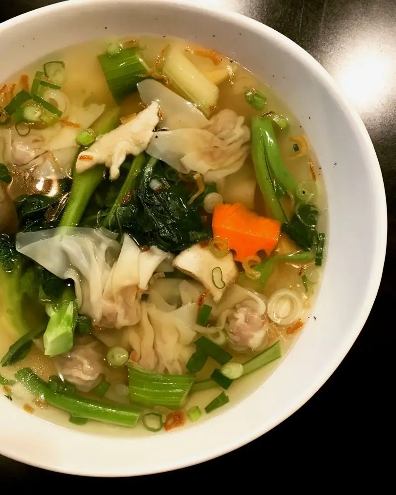 Wor Wonton soup with house made wontons, greens and carrots